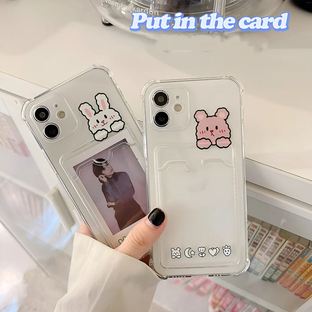 Transparent cartoon graphic iPhone back cover case with a slot for holding credit cards.