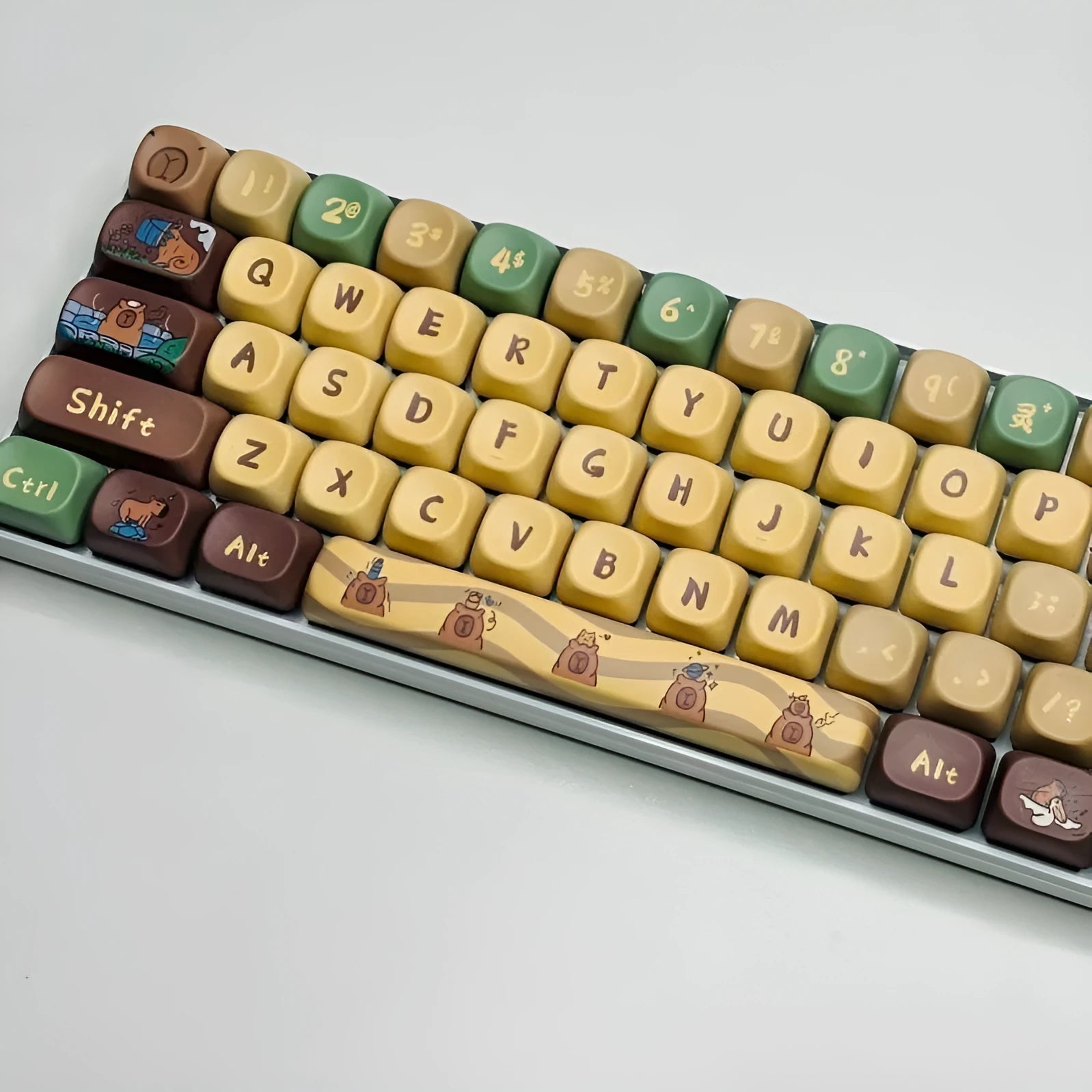 Capabala PBT mechanical keyboard keycap set showing 130 colourful keycaps with clear printed legends