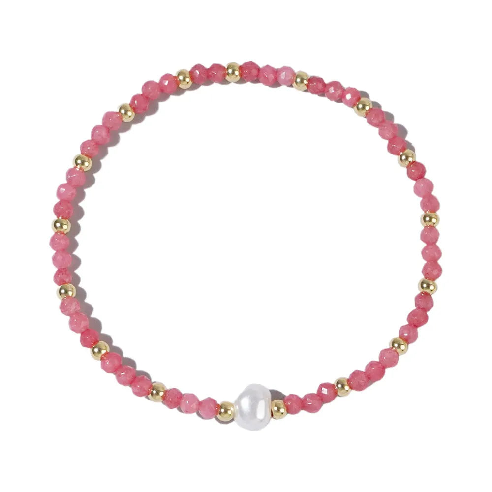 A geometric natural stone bracelet with an ellipse detail, shown in one of fifteen available colour options.