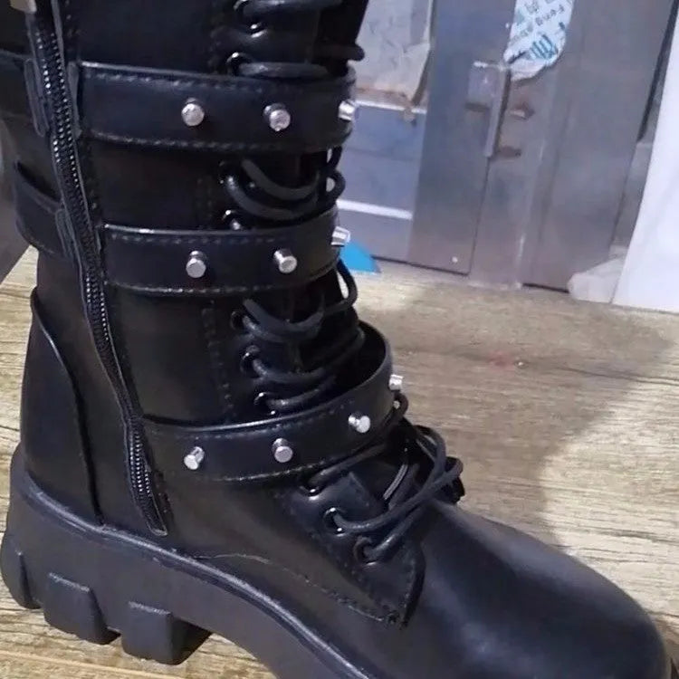 Women's black mid-calf knight boots with metal buckle and side zipper detail