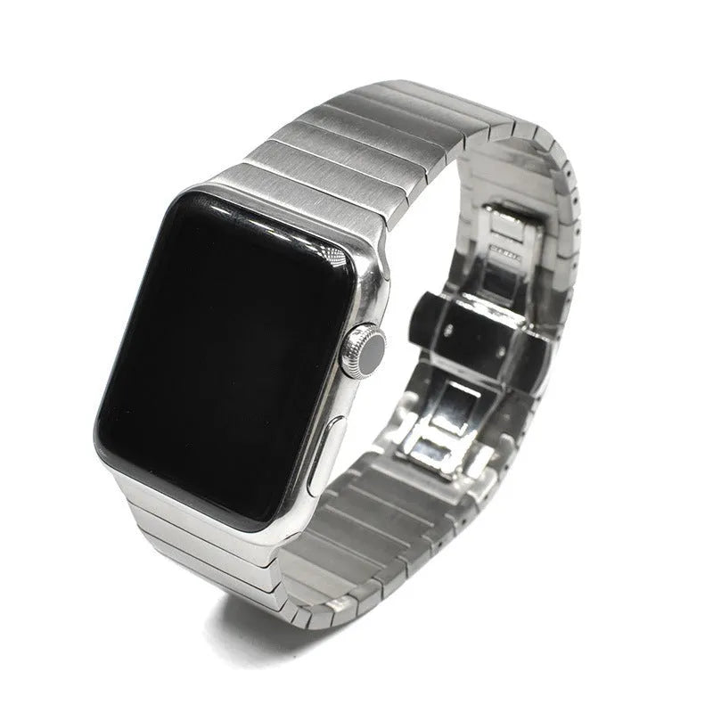 Silver metal Apple Watch band with butterfly buckle closure on 42mm Apple Watch case