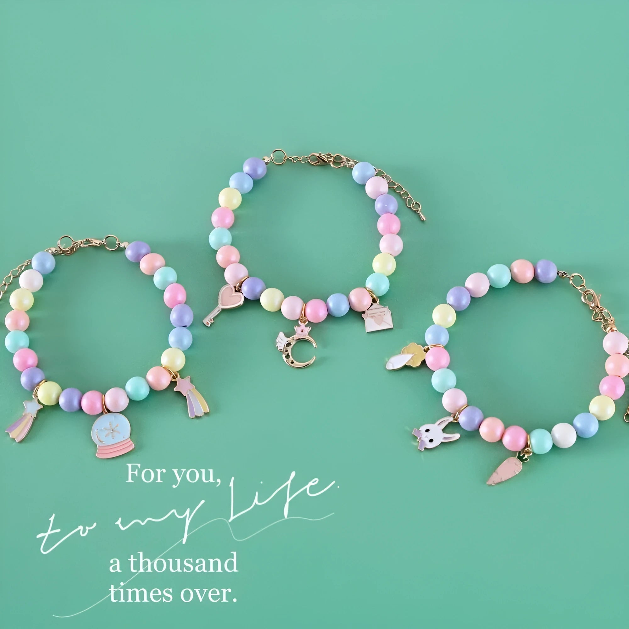 Pastel macaron charm pet collar with moon and rabbit designs on adjustable resin band for cats and dogs