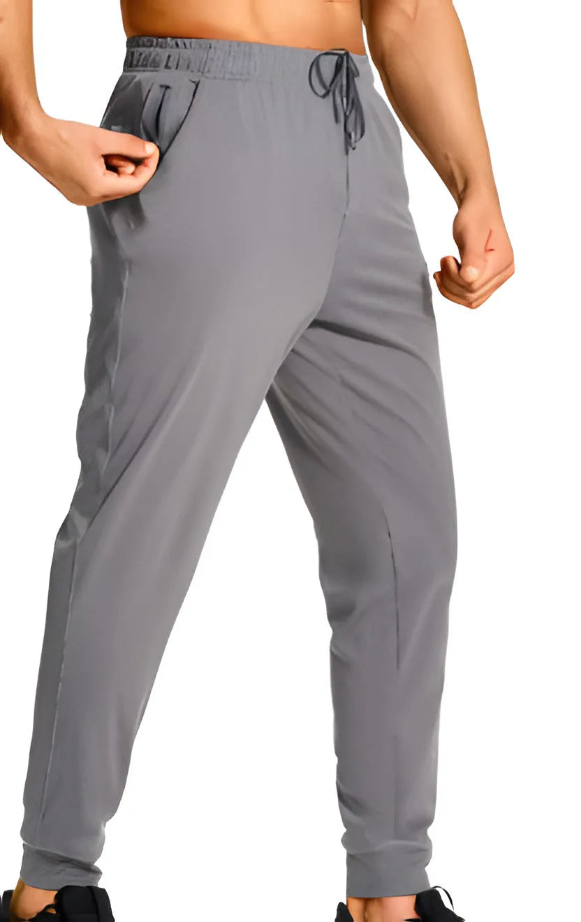 Men's loose-fit straight-leg casual trousers in a solid colour, made from polyester fabric.
