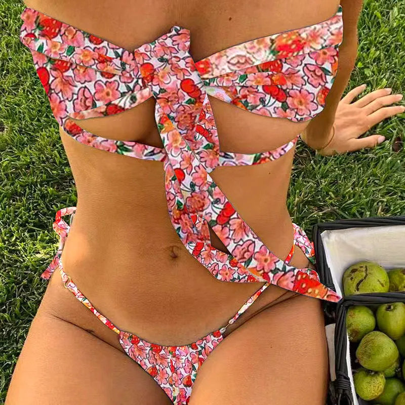 Women's swimsuit with lace-up front and chest padding in floral print design