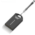 Mini black aluminium USB flash drive showing compact size next to coin for scale