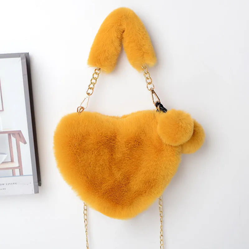 Soft plush heart-shaped women's handbag with zipper closure in various colours