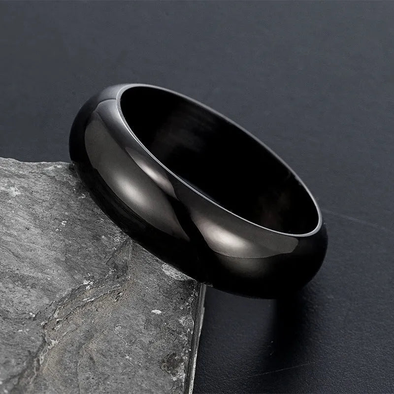 Glossy electroplated titanium steel ring in gold, black or steel colour showing shiny band design.