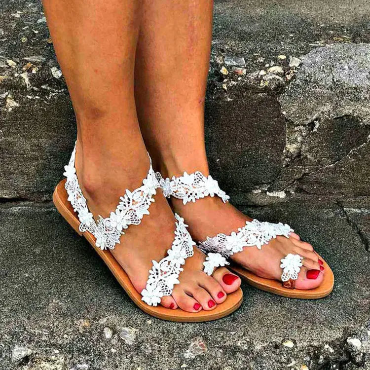 White women's flat sandals with rhinestone floral decoration and round toe slip-on design