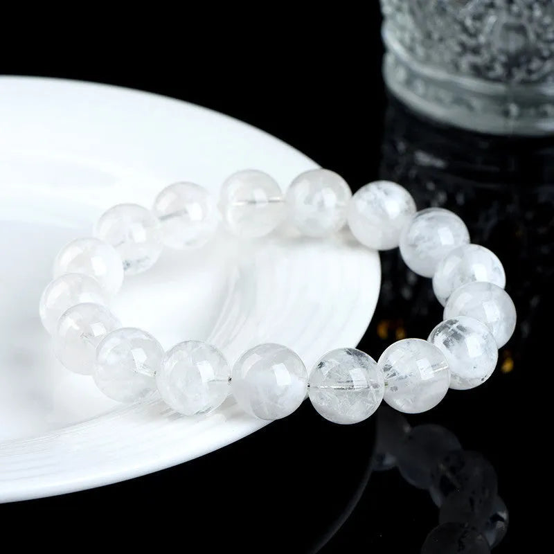 Women's crystal bracelet with natural blizzard snowflake round beads and geometric Ruyi Xiangyun design elements