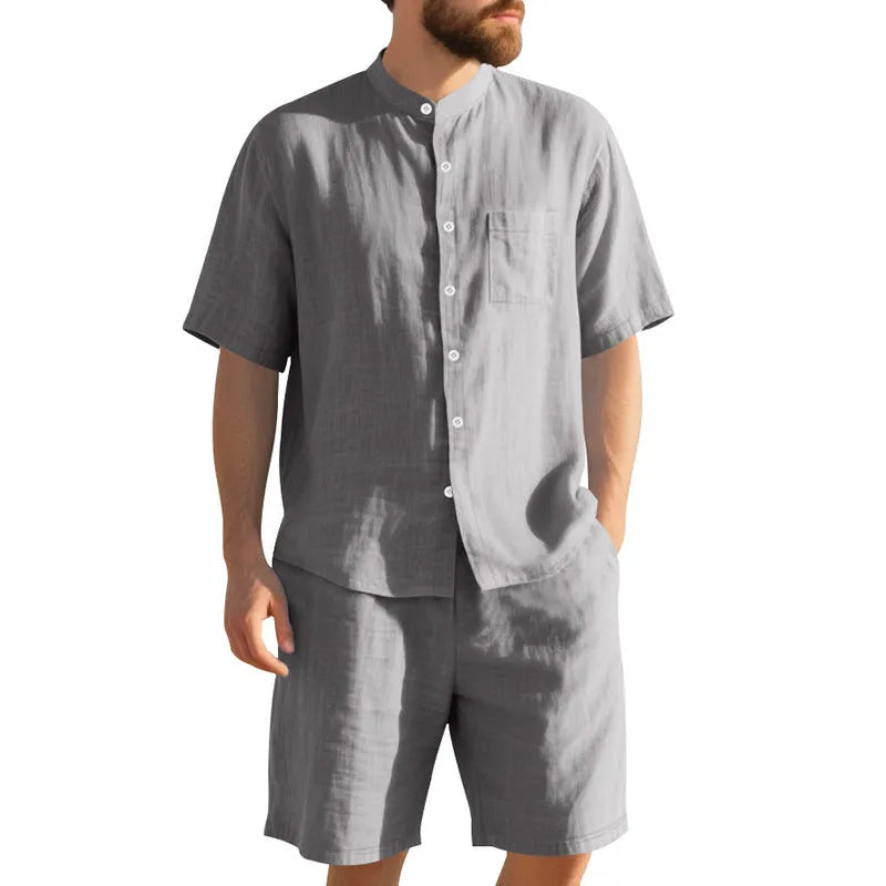 Men's light blue short-sleeve linen shirt and matching shorts, a casual two-piece summer suit set.