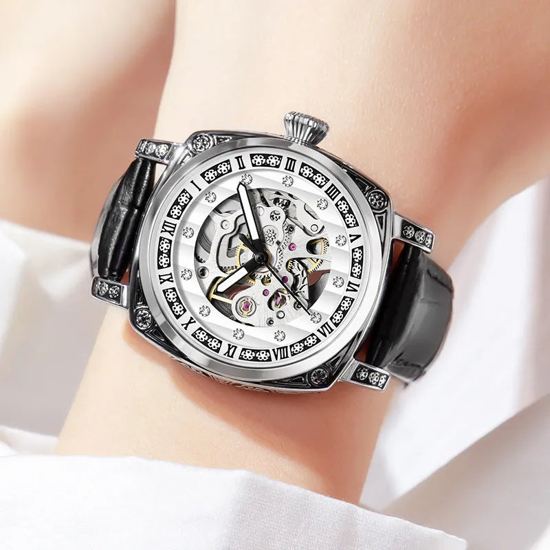 Men's black dial mechanical watch with luminous hands on a leather strap, showing 10m waterproof rating.