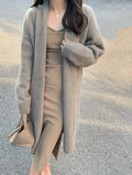 Women's mid-length V-neck knitted cardigan in khaki colour with long sleeves