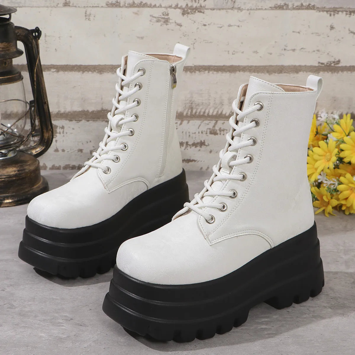 Women's white retro platform ankle boots with patchwork design and side zipper.