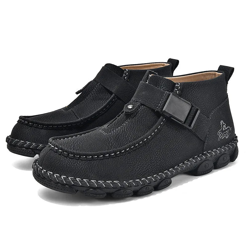 Men's black casual slip on loafers with visible stitching and a flat sole.