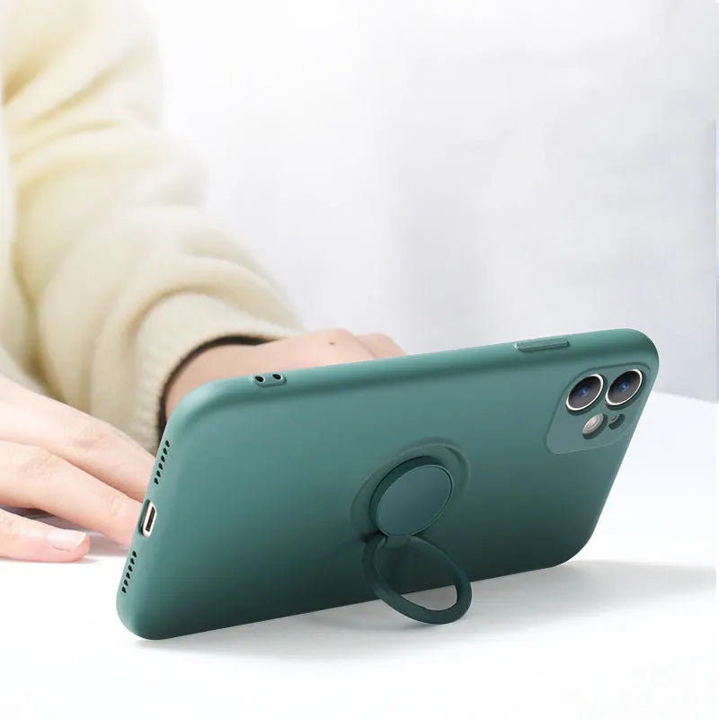 Liquid silicone iPhone 12 case with an integrated ring holder on the back, shown in a choice of colours.