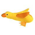 Yellow plush duck dog toy with a sound module and treat-dispensing openings.