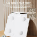 White professional body fat scale with eight electrodes and tempered glass platform