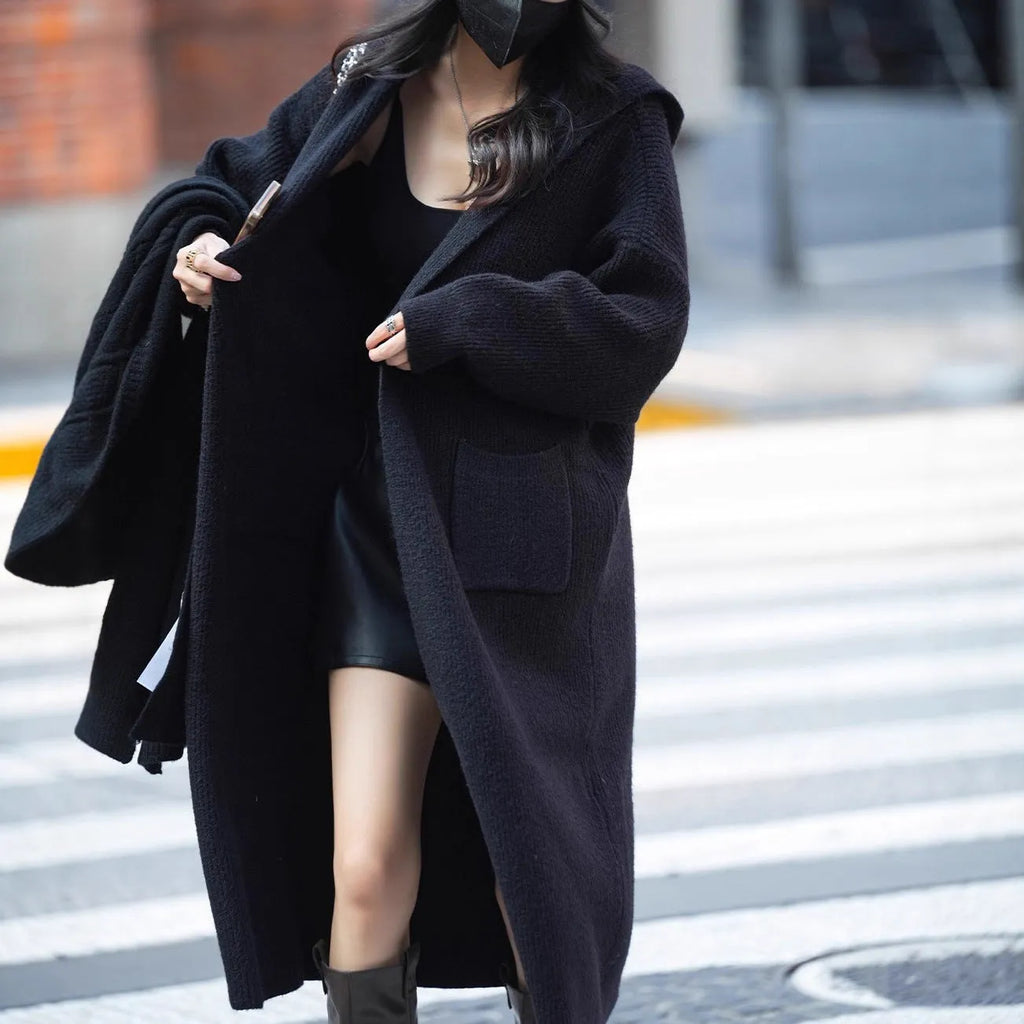 Long grey knitted cardigan hooded trench coat with splicing detail on mannequin
