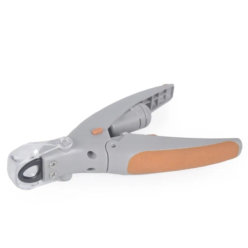 White and blue dog nail clipper with a visible blood line indicator window and a separate safety guard on a blister card.