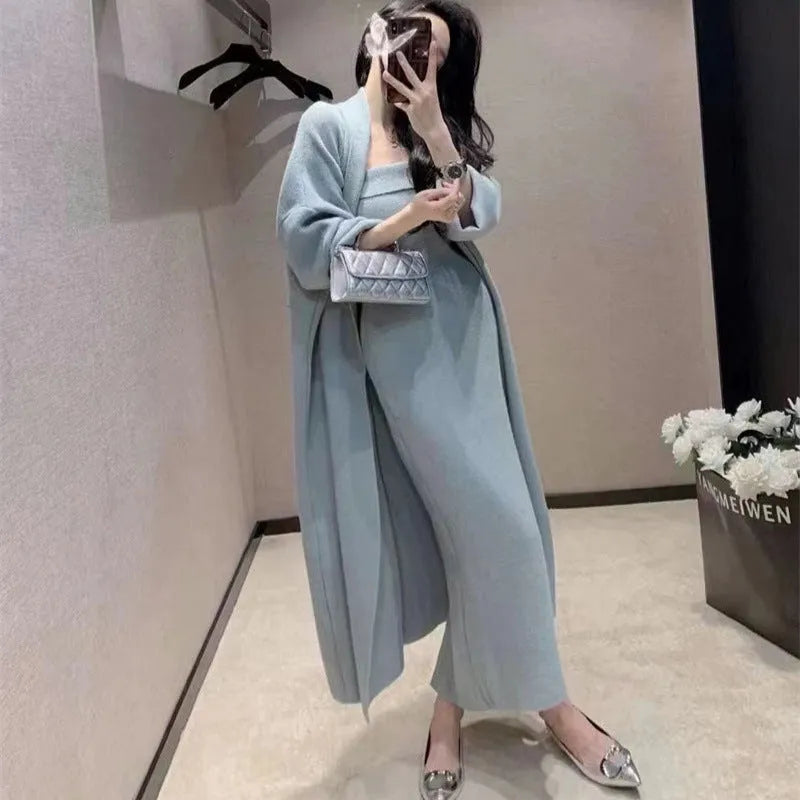 Women's grey knitted cardigan dress sweater suit two piece set with long skirt and regular sleeves.