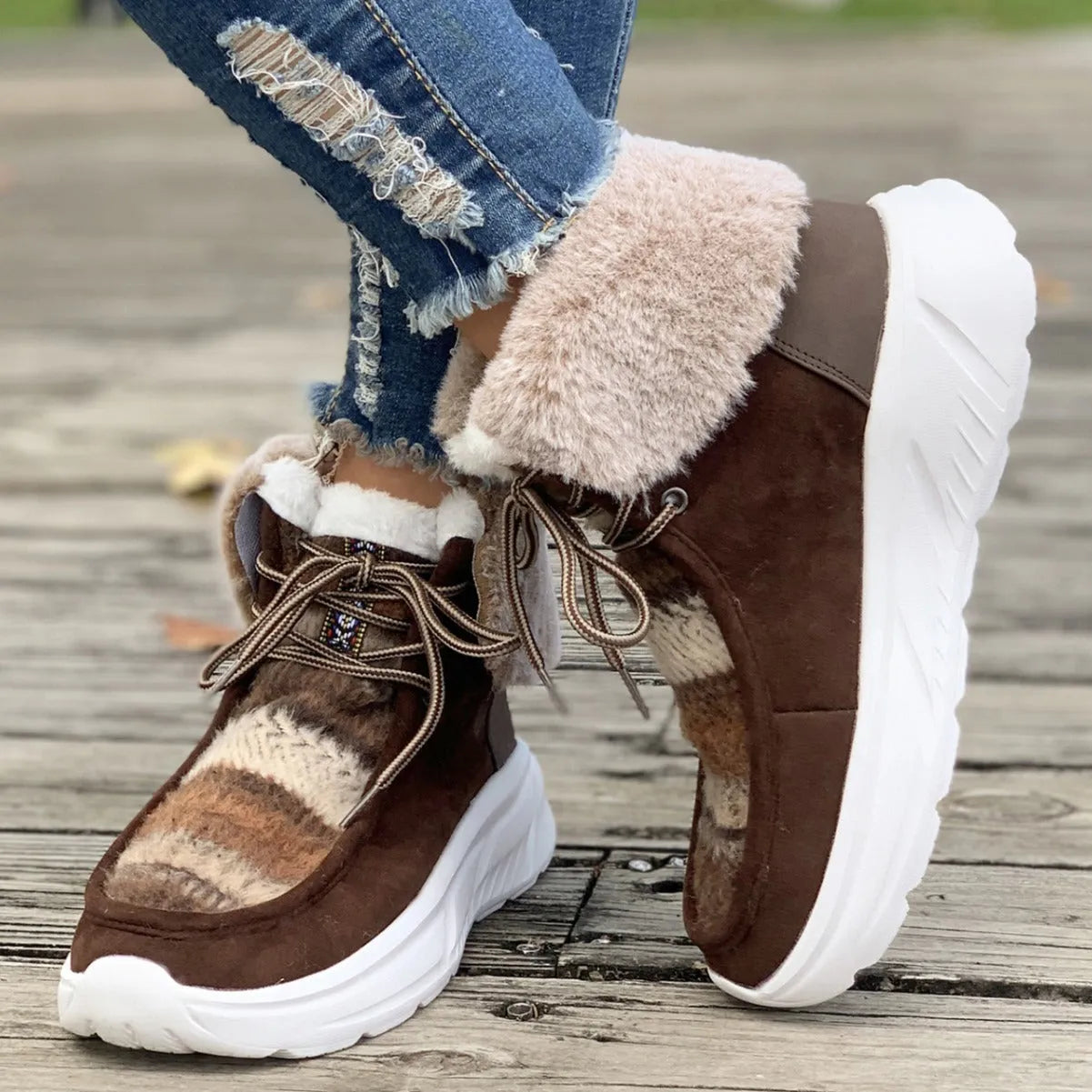 Women's beige lace-up snow boots with suede upper and platform sole