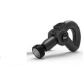 Black smart muscle massage gun with multiple attachment heads on a table