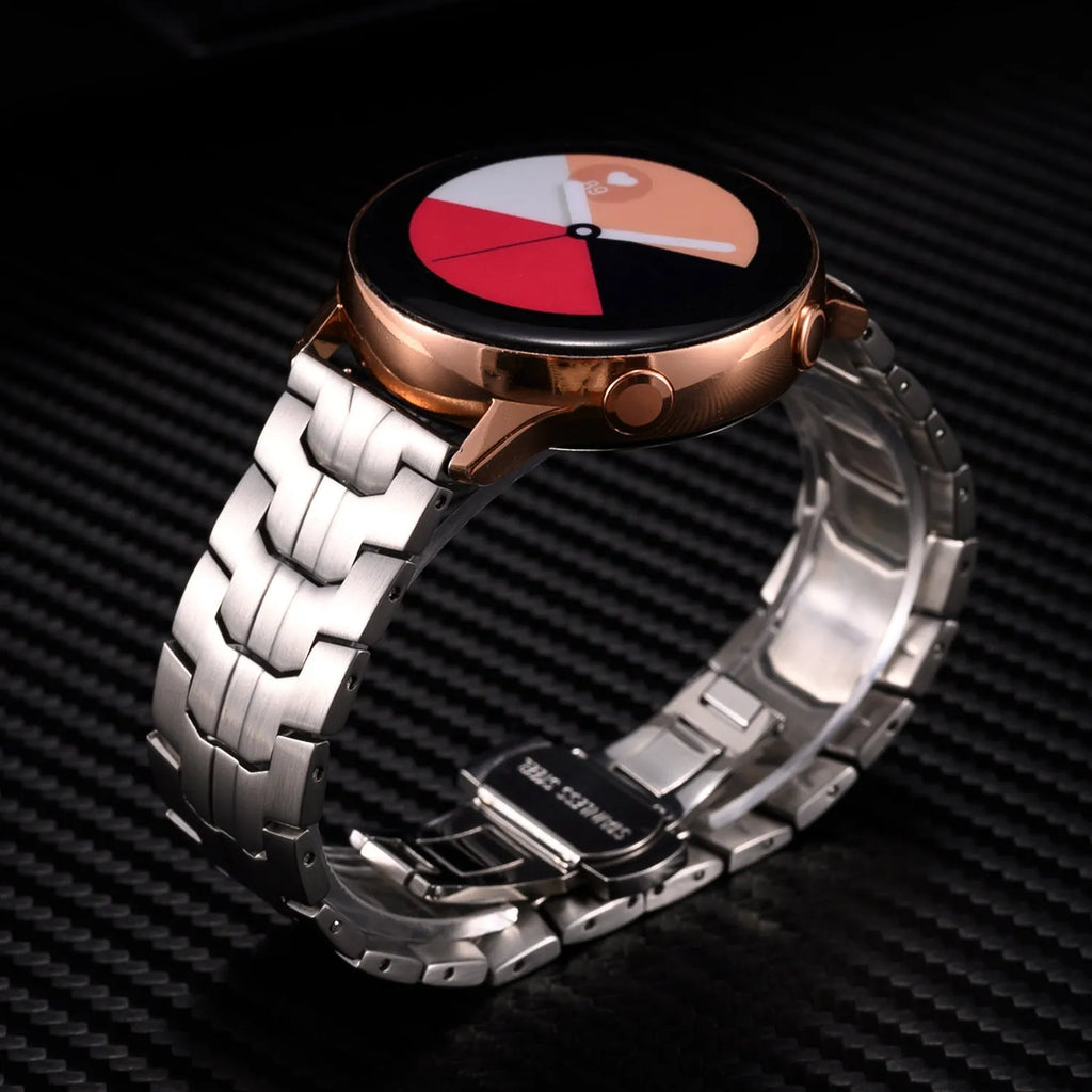 Stainless steel watch band for Samsung Galaxy Watch in silver, black, titanium, blue, and two-tone colour options.