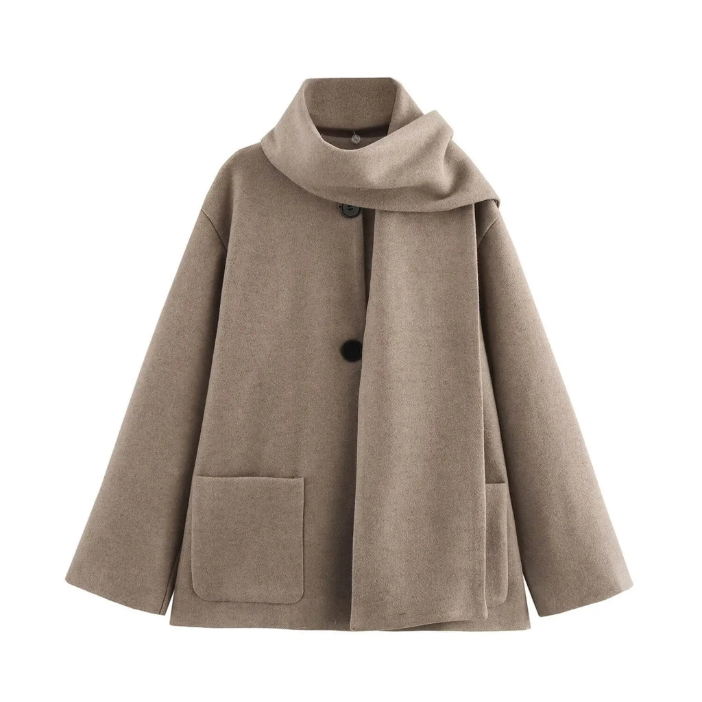 Women's long black polyester overcoat with artificial fur collar, shown at full length.