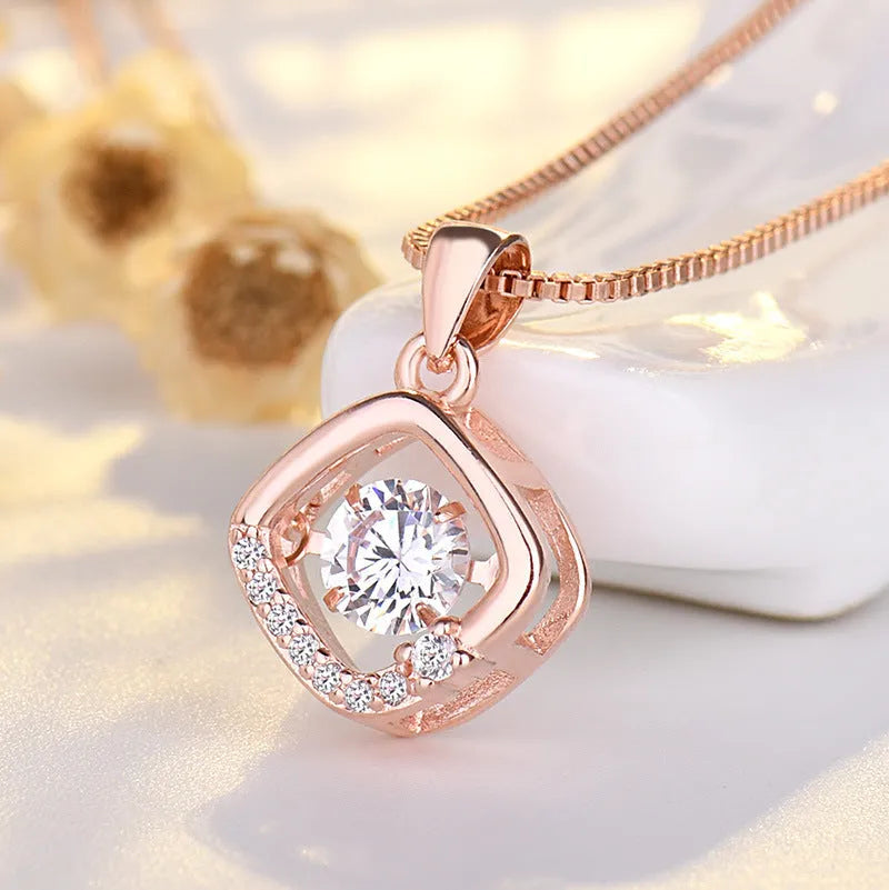 Sterling silver heart pendant necklace with crown detail on adjustable chain
