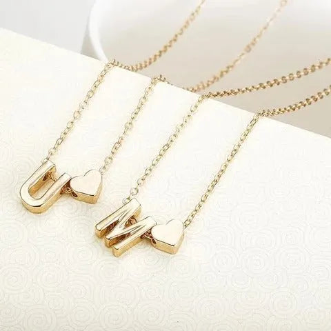 Peach heart shaped pendant with initial letter in gold or silver alloy jewellery