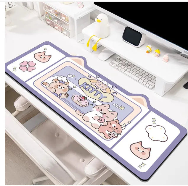 Oversized natural rubber mouse pad desk mat in pink bunny design on desk surface