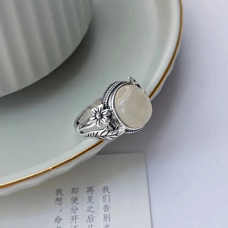 Adjustable copper vintage ring with white chalcedony stone and U-shaped band