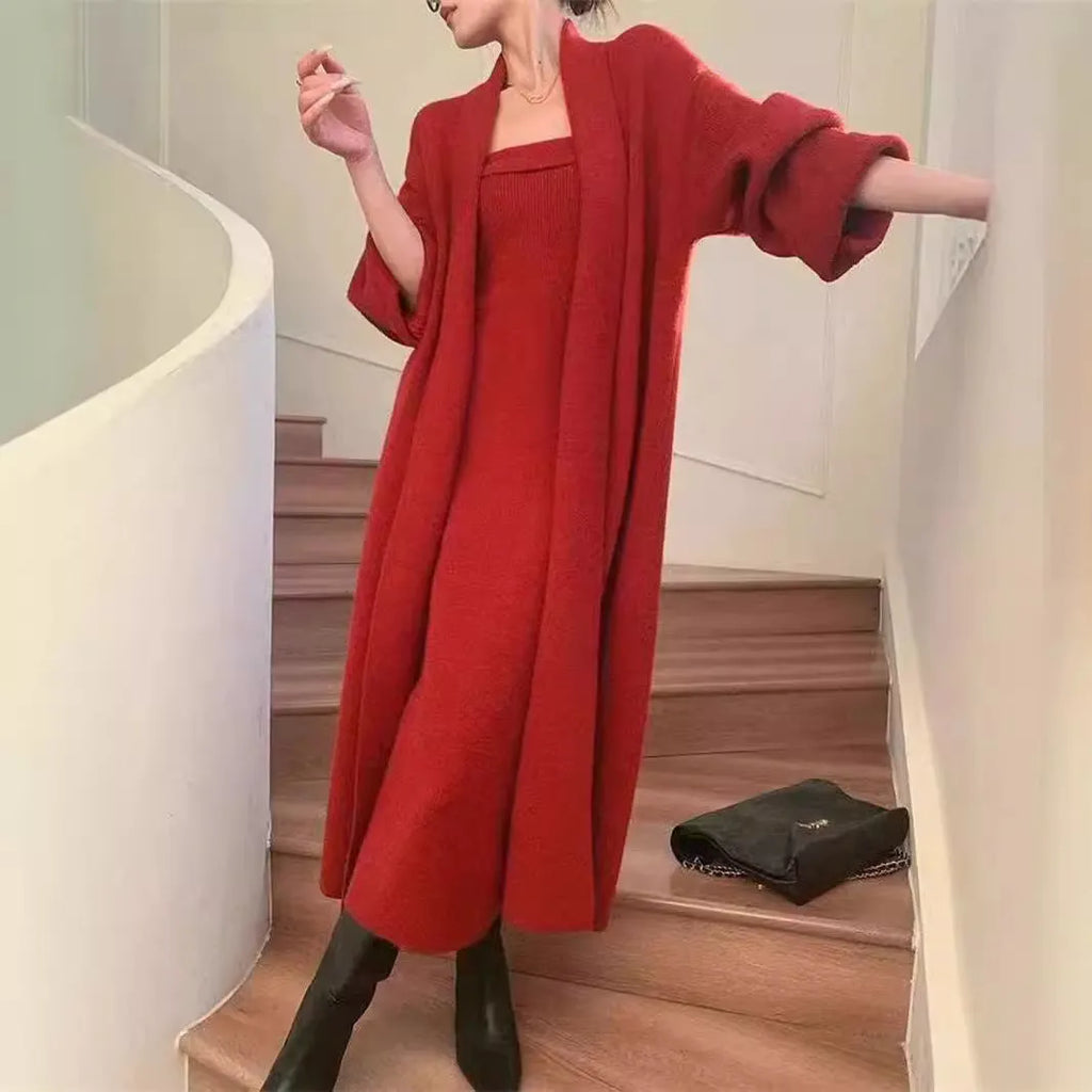 Women's grey knitted cardigan dress sweater suit two piece set with long skirt and regular sleeves.