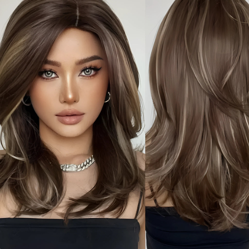 Mid-length curly full-head synthetic wig with long bangs in a platinum gradient colour.