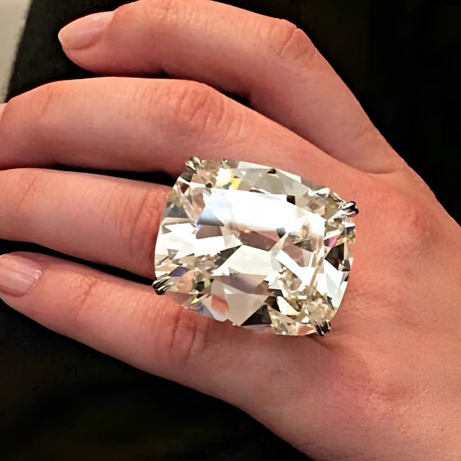 Simple geometric women's alloy ring with an inlaid white square diamond and a white gold colour finish.