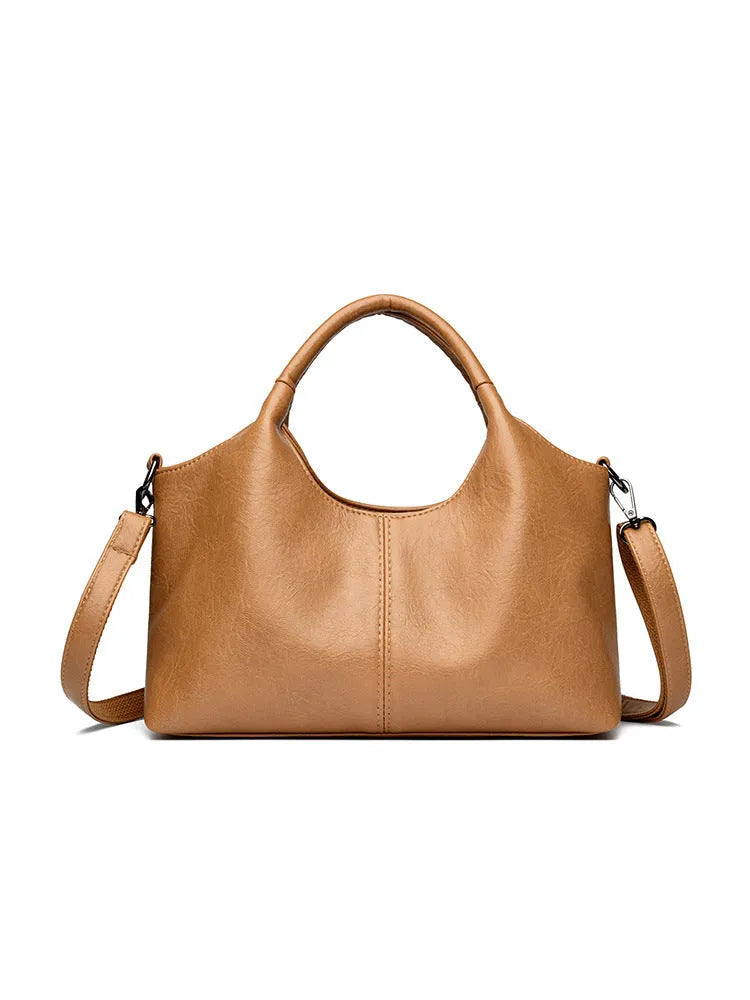 Genuine leather women's cross-body bag in seven colour options with soft texture and large capacity