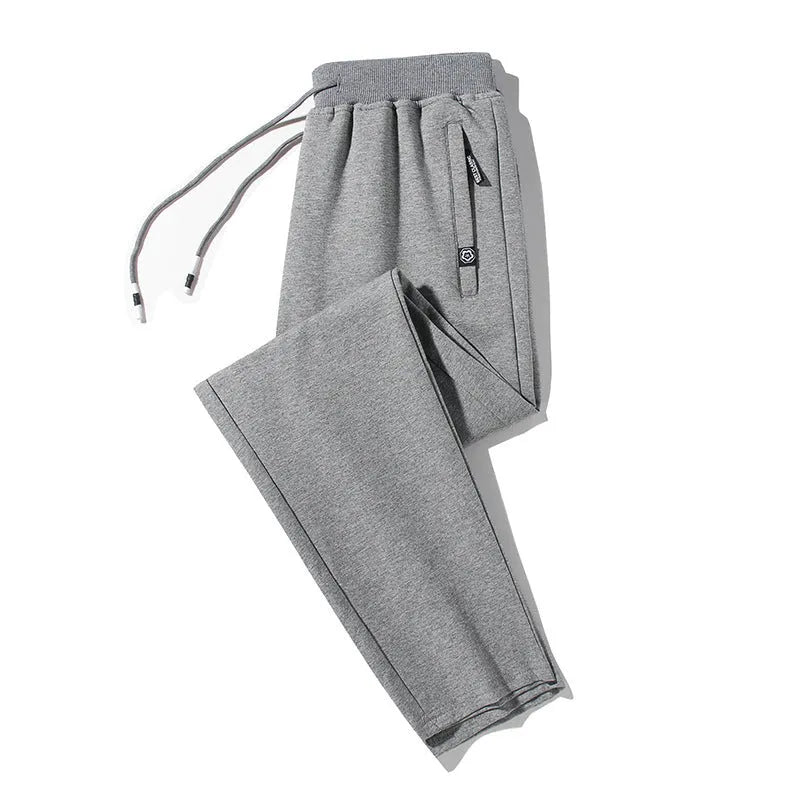 Plum Label men's large size cotton drawstring sweatpants in flat black, loose closed leg style