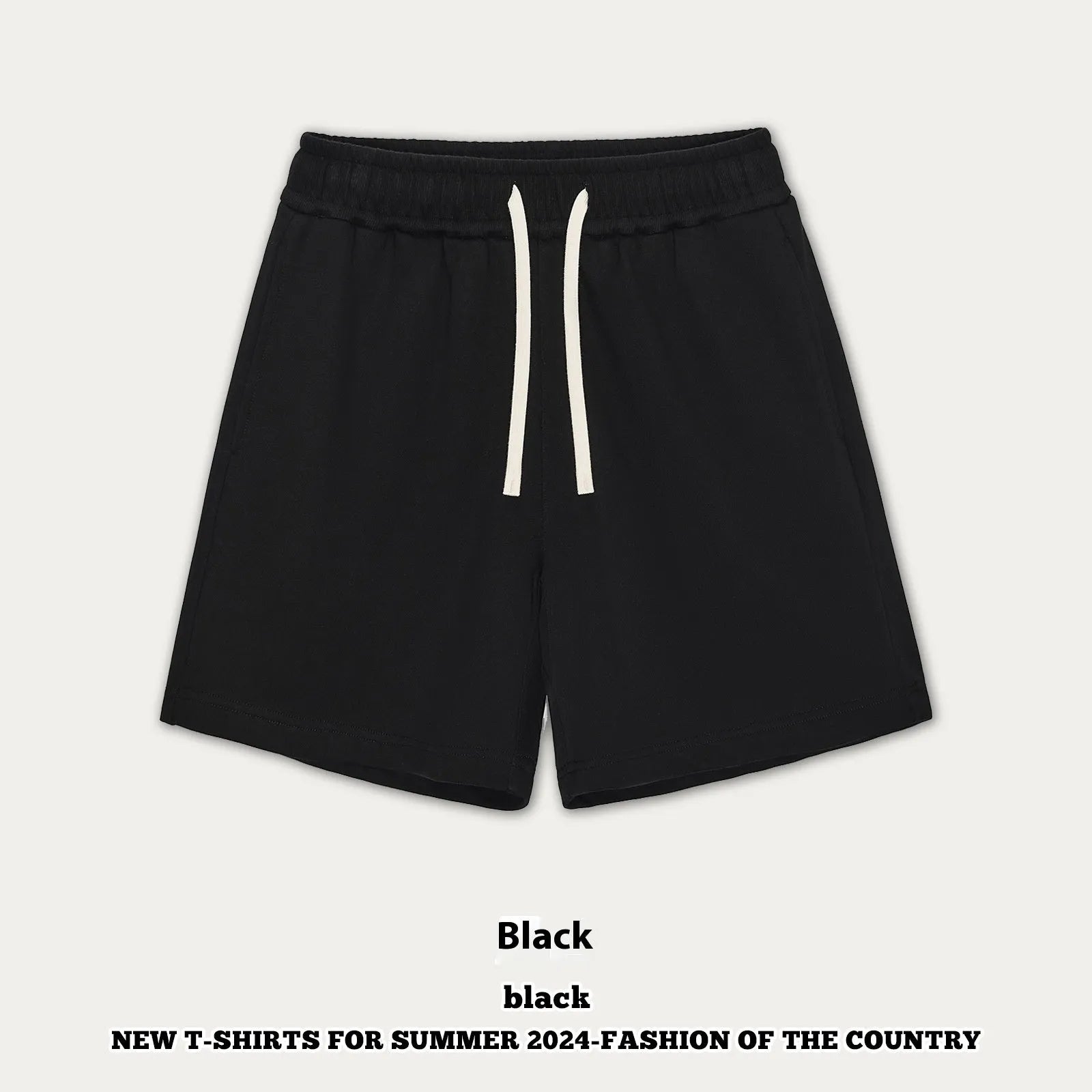 Loose fit cotton denim baby shorts in charcoal grey on a hanger