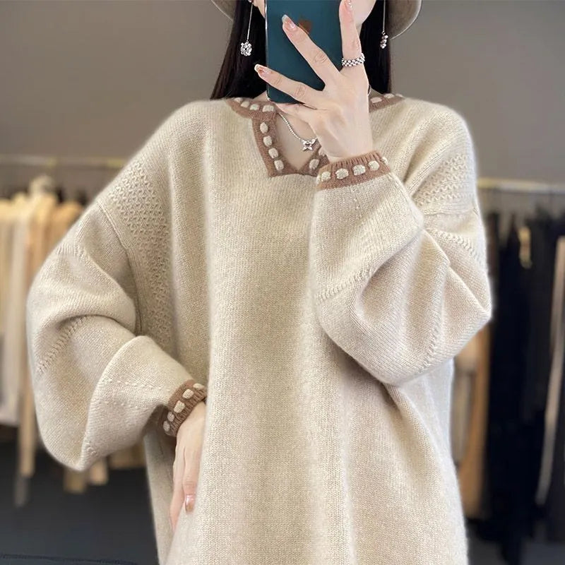 Women's camel and white V-neck viscose sweater with long sleeves showing pullover design