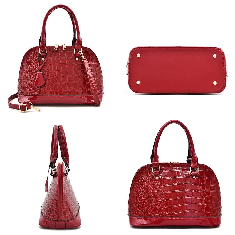 Shiny PU crossbody shoulder bag in shell shape showing black, brown, and red colour options