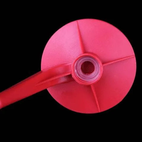 Red plastic Magic Tap soda dispenser accessory for 2-litre bottles