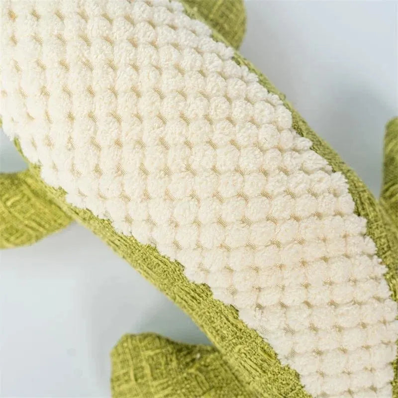 Blue, green, and red plush pet toys with corn grid texture and biting sound feature