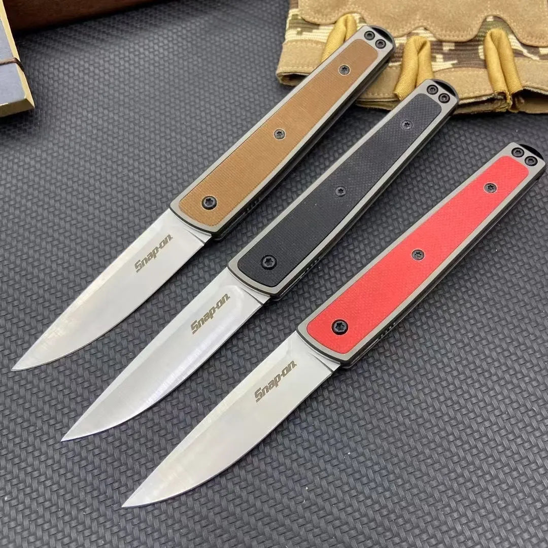 Folding fruit knife with stainless steel blade in black, red or coffee colour options, shown open to 17cm total length
