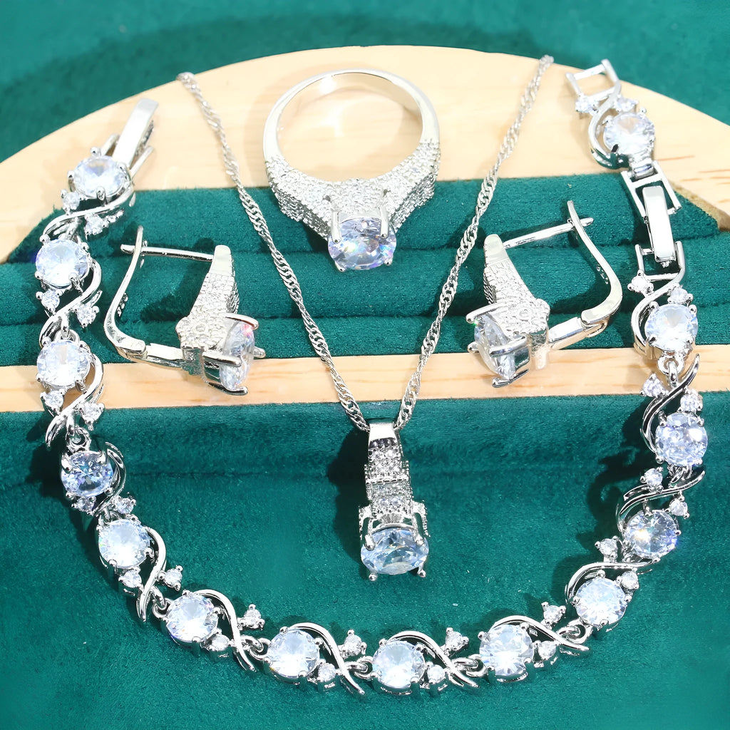 Bridal zircon necklace, earrings, ring, and bracelet four-piece jewellery set in alloy.