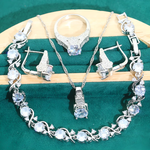 Bridal zircon necklace, earrings, ring, and bracelet four-piece jewellery set in alloy.