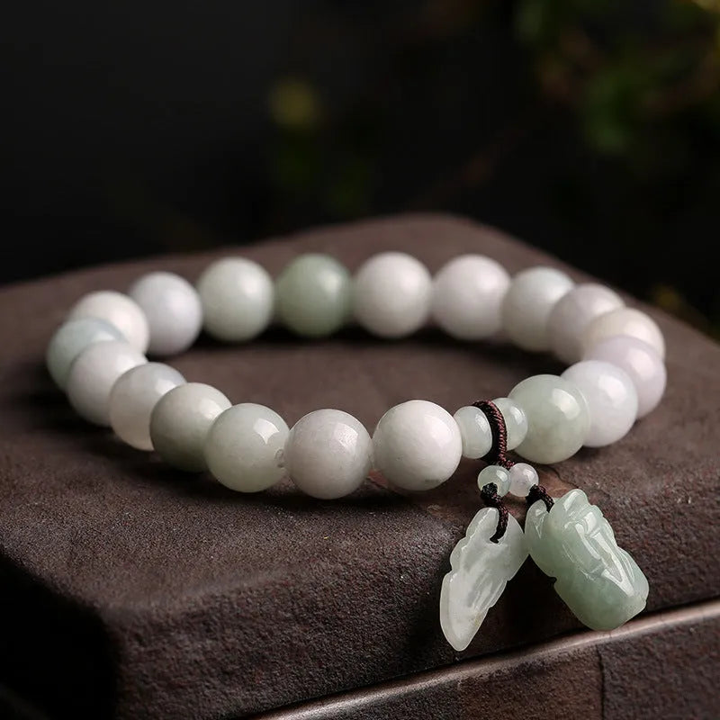 Adjustable natural jade bracelet with geometric pendant and symbolic apple, Maitreya, gourd, and money bag charms.