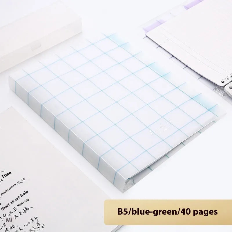 Refillable loose-leaf spiral notebook with PP cover open, showing raw wood pulp paper in grid ruling.