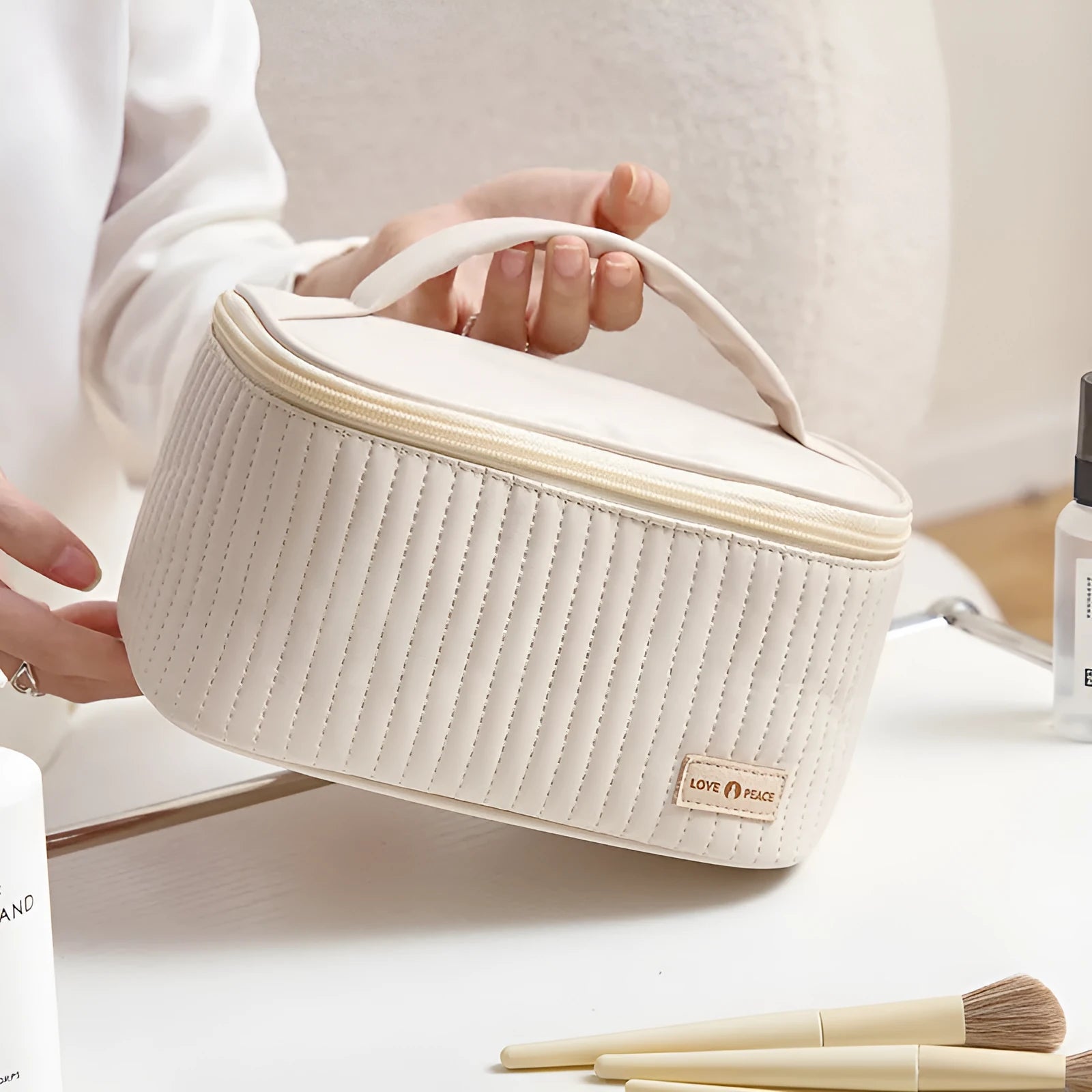 Open-top cake-shaped makeup bag in PU leather, shown in a solid colour from the pink, coffee, beige, blue, green, purple range.
