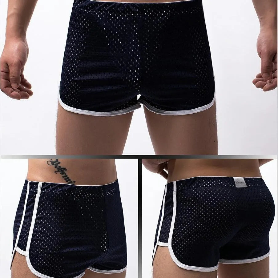 Men's black three-point boxer shorts made from a knitted cotton and nylon fabric.