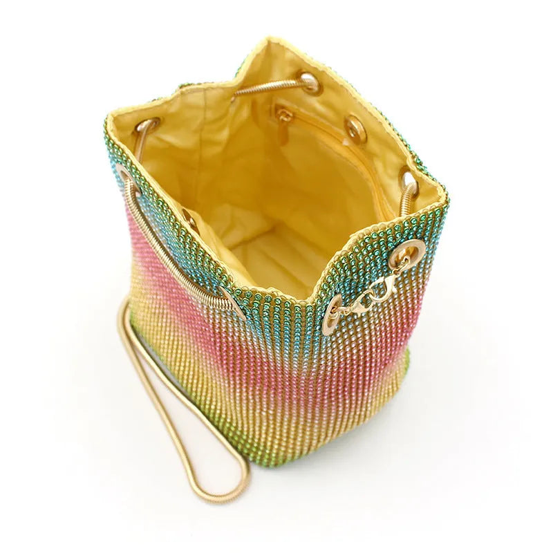 Rainbow rhinestone bucket bag with sparkling crystal surface and soft bucket shape